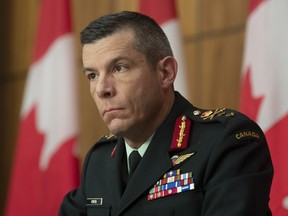 Maj.-Gen. Dany Fortin responds to a question during a news conference in Ottawa on Monday, Dec. 7, 2020.