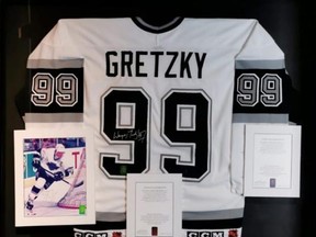 A Wayne Gretzky Los Angeles Kings jersey and signed photograph is shown in a handout from Ripley Auctions.