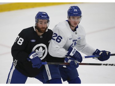 Toronto Maple Leafs T.J. Brodie D (78) checks Jimmy Vesey LW (26) at practice in Toronto on Tuesday January 12, 2021. Jack Boland/Toronto Sun/Postmedia Network