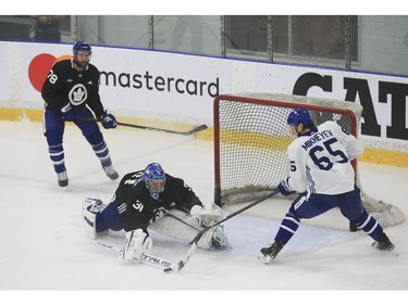 Toronto Maple Leafs Frederik Andersen G (31) stops Ilya Mikheyev RW (65) at practice in Toronto on Tuesday January 12, 2021. Jack Boland/Toronto Sun/Postmedia Network