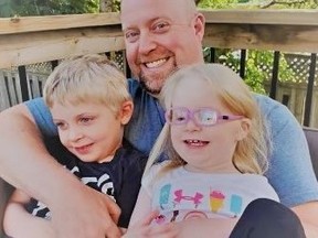 Peel Regional Police Det. Mike Nielsen, seen here with his kids Kayleigh and Carson, died at home on Tuesday, Jan. 19, 2021.