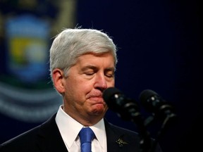 Michigan Governor Rick Snyder pauses as he speaks at North Western High School in Flint, a city struggling with the effects of lead-poisoned drinking water in Michigan, May 4, 2016.