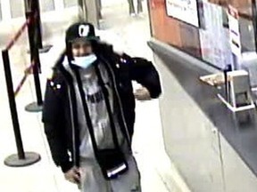 Investigators need help identifying this man, who is one of two suspects sought for a shooting that occurred at Crescent Town Rd. and Victoria Park Ave. on Dec. 23, 2020.