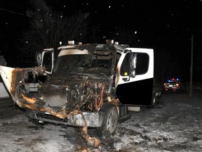 A tow truck set on fire outside of a home in Whitchurch-Stouffville on Monday, Jan. 18 2021.