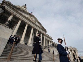 The Honour Guard arrives at the East Front of the U.S. Capitol during the dress rehearsal ahead of U.S. President-elect Joe Biden's inauguration in Washington, U.S., January 18, 2021. Rod Lamkey/Pool via REUTERS ORG XMIT: POOL01