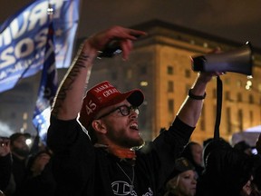 Supporters of U.S. President Donald Trump gather at a rally at Freedom Plaza, ahead of the U.S. Congress certification of the November 2020 election results, during protests in Washington, U.S., January 5, 2021.