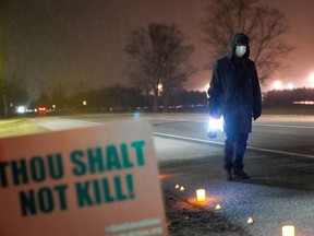 Bill Breeden, an anti-death penalty advocate, protests the execution of Dustin Higgs, outside the United States Penitentiary in Terre Haute, Indiana, U.S. January 15, 2021. Picture taken January 15, 2021.