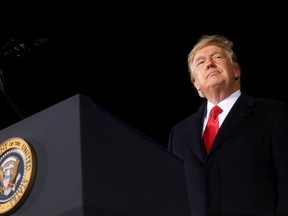 U.S. President Donald Trump addresses a campaign rally in Dalton, Georgia, U.S., on the eve of the run-off election to decide both of Georgia's Senate seats January 4, 2021.