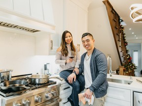 Chef Eric Chong and his fiancee Jen in their kitchen. SUPPLIED