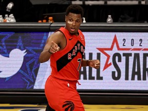 Raptors' Kyle Lowry celebrates a three-pointer on Friday against the Brooklyn Nets.
