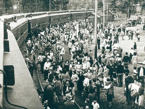 Photograph shows Japanese-Canadians in Slocan City, B.C. waiting for internment in detention camps during the Second World War..