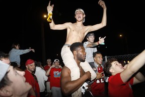 Tampa Bay Buccaneers fans celebrate after Super Bowl LV on February 7, 2021 in Tampa, Florida.