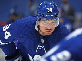 Auston Matthews of the Toronto Maple Leafs waits for a faceoff against the Vancouver Canucks during an NHL game at Scotiabank Arena on February 8, 2021 in Toronto, Ontario, Canada.