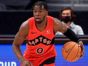 Terence Davis #0 of the Toronto Raptors looks to pass during a game against the Sacramento Kings at Amalie Arena on January 29, 2021 in Tampa, Florida.