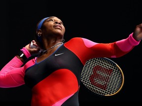 Serena Williams of the United States of America serves in her Women's Singles first round match against Laura Siegemund of Germany during day one of the 2021 Australian Open at Melbourne Park on February 8, 2021 in Melbourne.