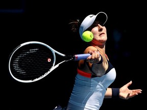 Bianca Andreescu of Canada plays a forehand against Su-Wei Hsieh of Chinese Taipei during day three of the 2021 Australian Open at Melbourne Park on February 10, 2021.
