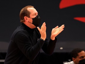 Toronto Raptors head coach Nick Nurse looks on during a game against the Philadelphia 76ers at Amalie Arena on February 21, 2021 in Tampa, Florida. .