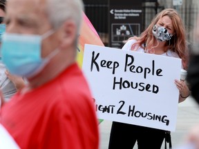 Elle Halladay from Lanark county joined about 40 people on Parliament Hill in July 2020 to protest COVID evictions and seek residential rent relief.