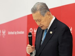 Tokyo 2020 Olympics organizing committee president Yoshiro Mori announces his resignation as he takes responsibility for his sexist comments at a meeting with council and executive board members at the committee headquarters, in Tokyo, Japan Feb. 12, 2021.