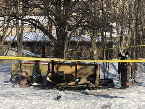 Toronto Police at the scene of a homeless encampment fire in Corktown on Wednesday, Feb. 17, 2021. A man was found dead.