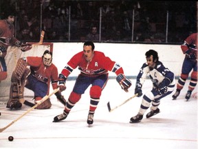Frank Mahovlich in full flight for the Montreal Canadiens in 1971, with goalie Ken Dryden in the background.