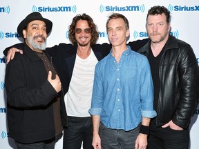 (L-R) Kim Thayil, Chris Cornell, Matt Cameron and Ben Shepherd of Soundgarden visit SiriusXM Studios on June 2, 2014 in New York City.