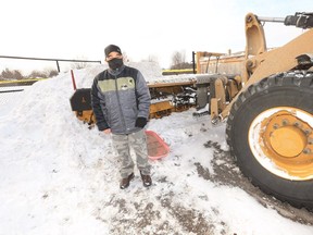 Noel Septimo is pictured at the location where two Whitby school children were hurt on Feb. 16, 2021, when a snowplow topped a chain-link fence. He helped dig the children out.