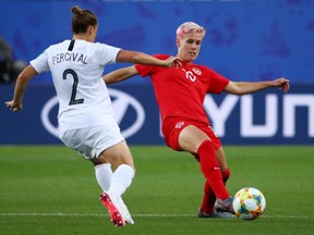 Canada's Sophie Schmidt in action with New Zealand's Ria at the Percival Stade des Alpes, Grenoble, France  on June 15, 2019.