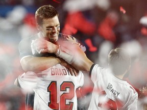 Tampa Bay Buccaneers' Tom Brady and his family celebrate after winning the Super Bowl LV at Raymond James Stadium, Tampa, February 7, 2021.