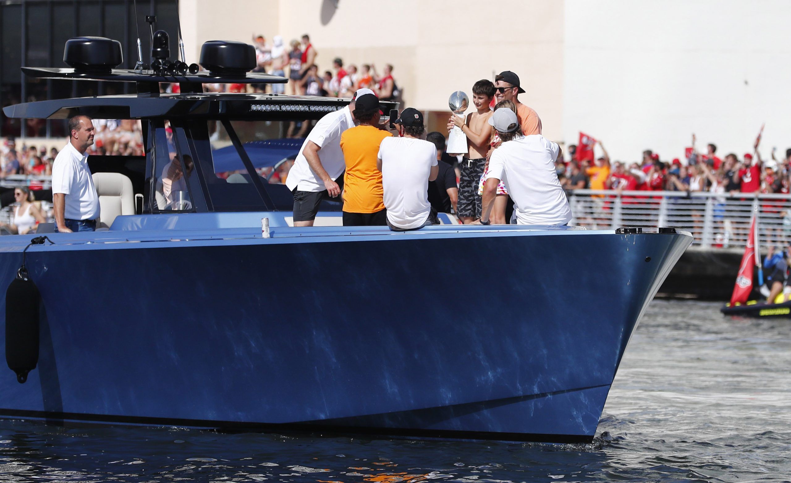 Tom Brady Tosses Lombardi Trophy During Rowdy Super Bowl Boat Parade ...