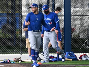 Blue Jays outfielder George Springer has a laugh during spring training.