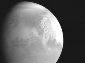 This handout photograph released on February 5, 2021 by the China National Space Administration (CNSA) shows an image of Mars captured by China's Mars probe Tianwen-1.