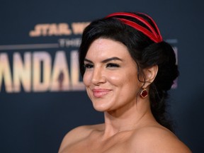 In this file photo taken on Nov. 13, 2019, American actress Gina Carano arrives for the Disney+ World Premiere of The Mandalorian at El Capitan theatre in Hollywood. Carano has been dropped by Lucasfilm after sharing "abhorrent" social media posts on topics including the Holocaust.