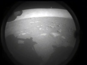This NASA photo shows the first images from NASA's Perseverance rover as it landed on the surface of Mars on February 18, 2021.