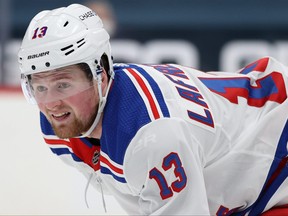 Alexis Lafreniere of the New York Rangers looks on against the Washington Capitals during the second period at Capital One Arena on Feb. 20, 2021 in Washington, D.C.