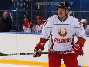 In this file photo taken Feb. 15, 2019, Belarus President Alexander Lukashenko takes part in a hockey game at Shayba Arena in the Black sea resort of Sochi, Russia.