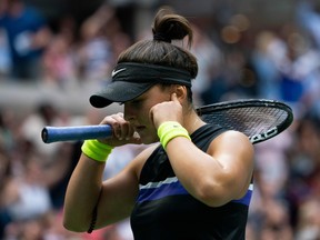 Bianca Andreescu of Canada plugs out the sound of the crowd while playing Serena Williams of the US  during their women's singles finals  match at the 2019 US Open at the USTA Billie Jean King National Tennis Center September 7, 2019  in New York.
