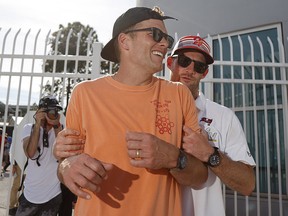 Tampa Bay Buccaneers quarterback Tom Brady and quarterback Ryan Griffin are seen after a boat parade to celebrate their win in Super Bowl LV against the Kansas City Chiefs.