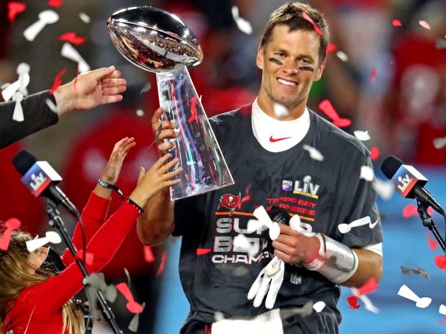 VIDEO: Tom Brady Throws the Lombardi Trophy From Boat