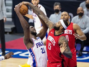Houston Rockets centre DeMarcus Cousins (15) blocks the shot attempt of Philadelphia 76ers centre Joel Embiid (21) at Wells Fargo Center.