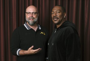 Director Criag Brewer and Eddie Murphy.