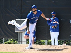 Big right-hander Alek Manoah, ranked as the No. 5 prospect on the Blue Jays by MLB Pipeline, limbers up during the team’s 
training camp in Dunedin yesterday.