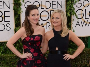 Tina Fey (left) and Amy Poehler (right) will host the Golden Globe Awards later this month.