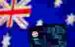 A smartphone with a Google app icon is seen in front of the displayed Australian flag in this illustration, January 22, 2021.  