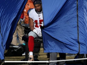 Golden Tate #15 of the New York Giants is tested for a concussion after taking a hit in the first quarter against the Chicago Bears at Soldier Field on November 24.