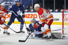 Calgary Flames’ Sam Bennett looks for a puck to tip over Maple Leafs goalie Michael Hutchinson during NHL action at Scotiabank Arena on Monday, Feb. 22, 2021 in Toronto. CLAUS ANDERSEN/GETTY IMAGES