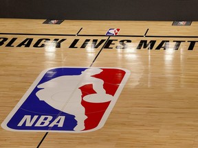 The Black Lives Matter logo is seen on an empty court as all NBA playoff games were postponed today during the 2020 NBA Playoffs at AdventHealth Arena at ESPN Wide World Of Sports Complex on Aug. 27, 2020 in Lake Buena Vista, Fla.