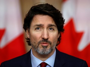 Prime Minister Justin Trudeau takes part in a news conference in Ottawa February 19, 2021.