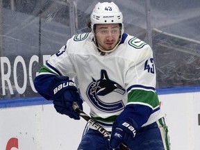 Defenceman Quinn Hughes leads the Vancouver Canucks in scoring with 14 points (on one goal and 13 assists) through 13 games.