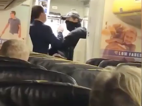 A passenger allegedly headbutted a flight attendant.